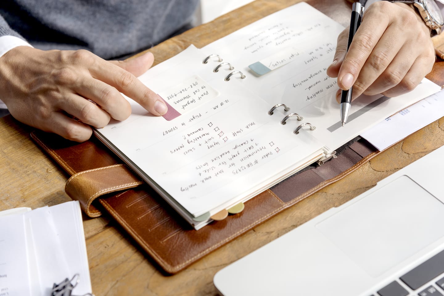 business-man-hands-schedule-notebook-concept-PWNX5CU